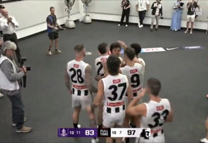 WATCH: Pies' touching show of support for concussed Schultz ... while repeatedly rubbing his head